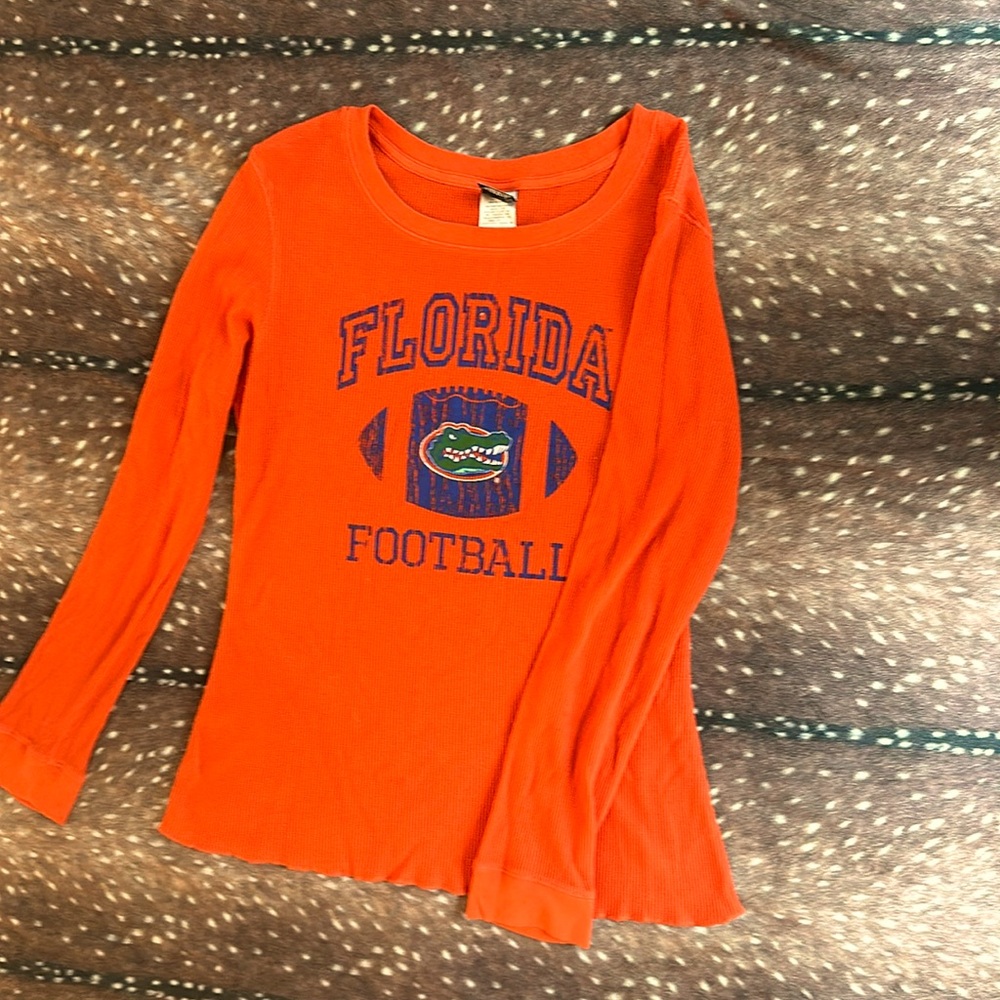 Creative apparel orange long sleeve Florida gators football shirt.